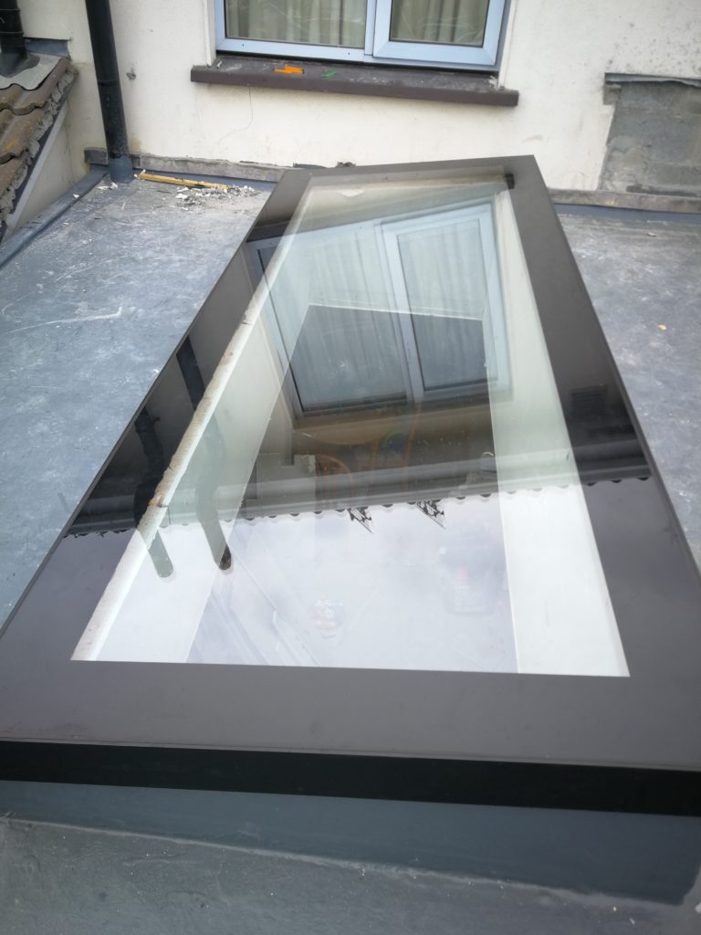 Rooflight installation at a kitchen and dining extension in Rush