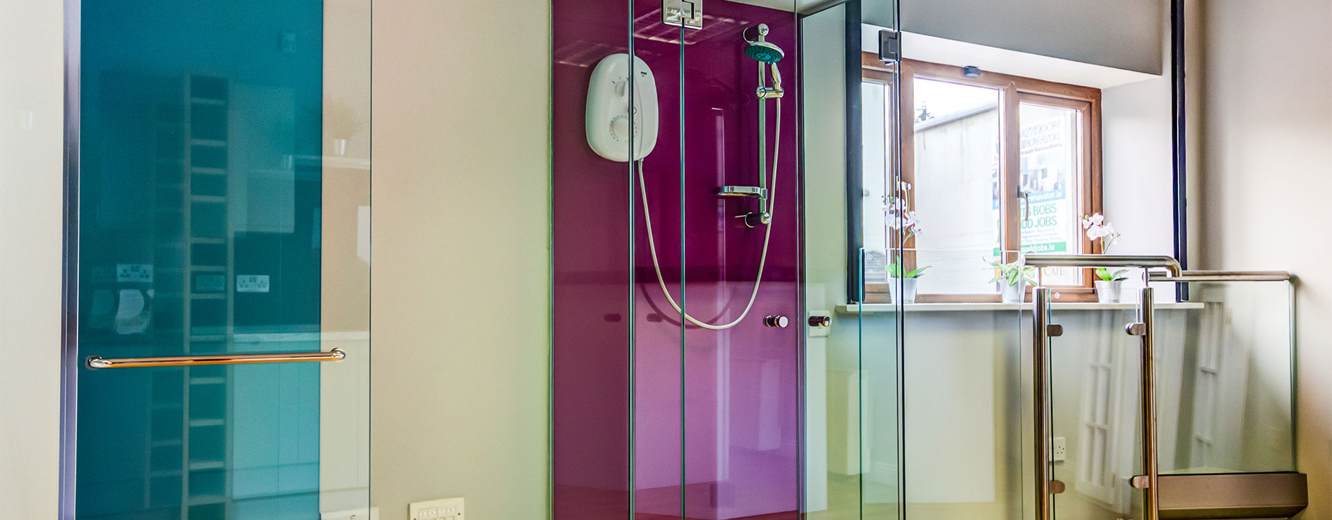 Glass shower enclosures displayed in the Allspec showroom